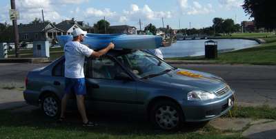 Dennis helps Janet with Kayak