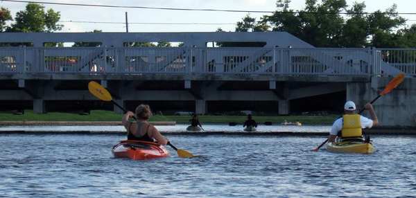 paddlers meet on the bayou